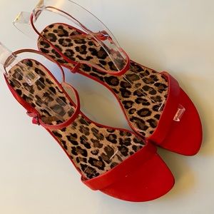 Stylish, red-hot sandals with leopard foot-soles and small sculpted heels. 8
